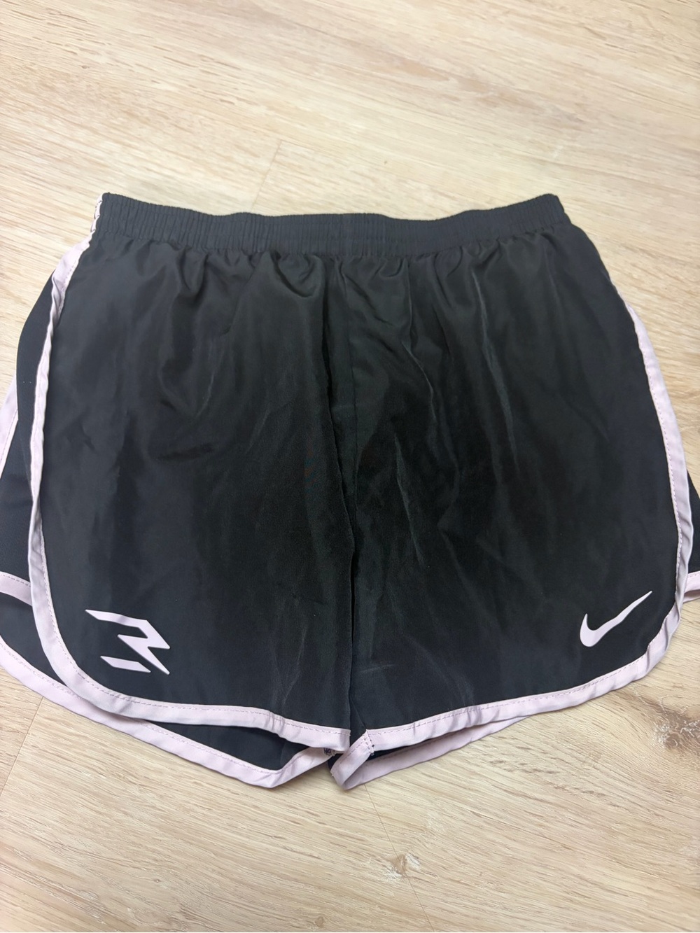 Nike Black Women's Athletic Shorts with Pale Pink Trim